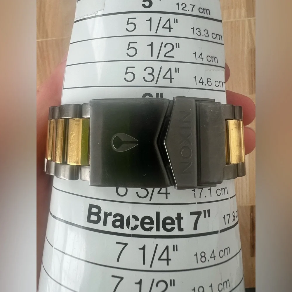 Nixon the player gunmetal gray and gold tone watch NEW BATTERY